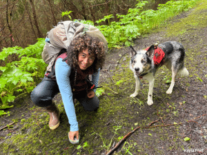 Field technician Nashaly Cortes collects a scat found by Niffler on Long Island.
